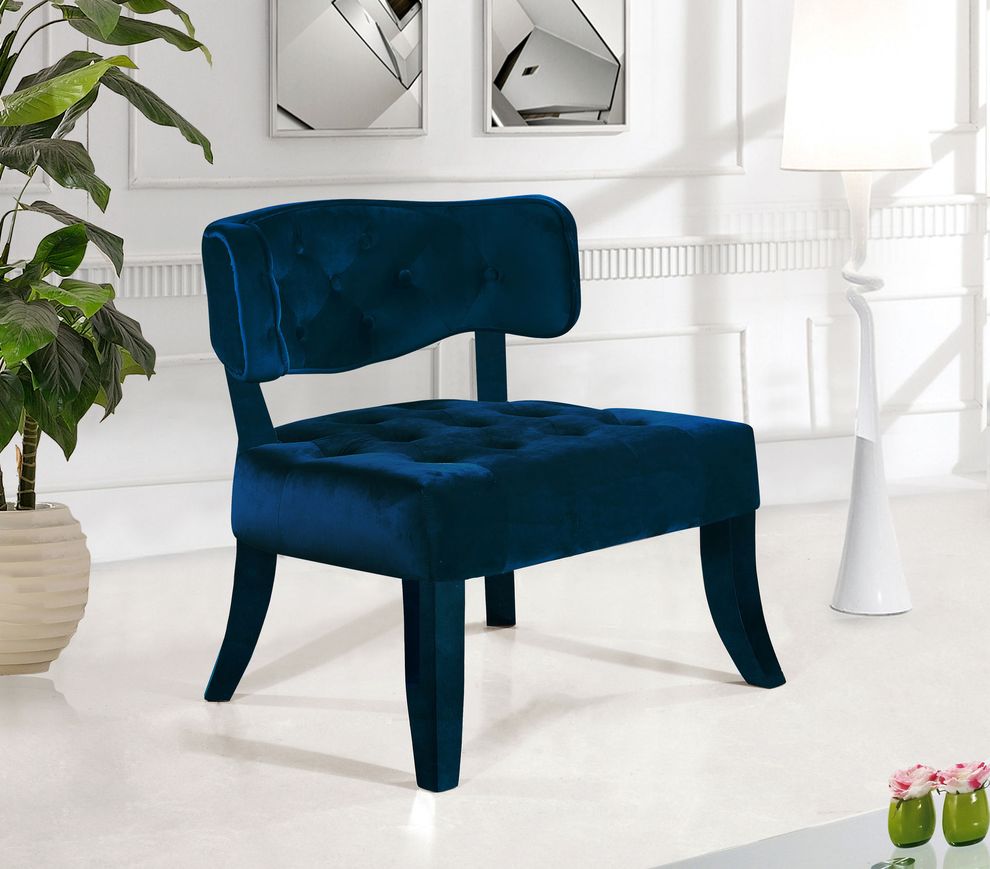 Velvet tufted chair in navy fabric by Meridian