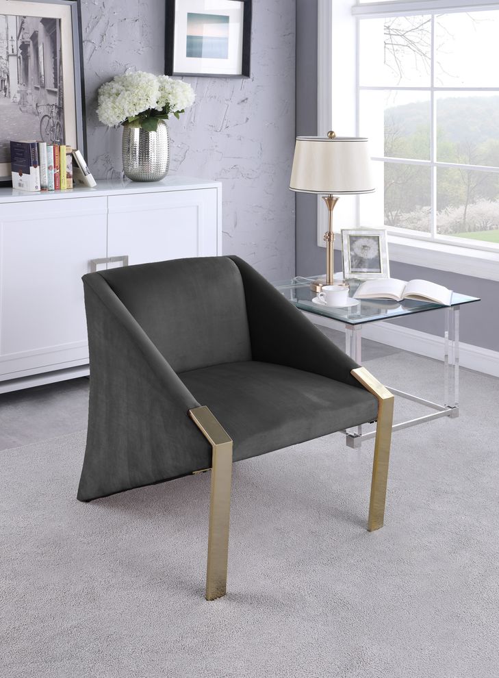 Acccent gold / velvet chair in contemporary design by Meridian