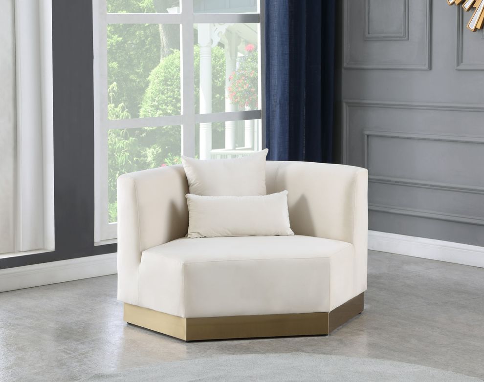 Modular design / gold base cream chair by Meridian