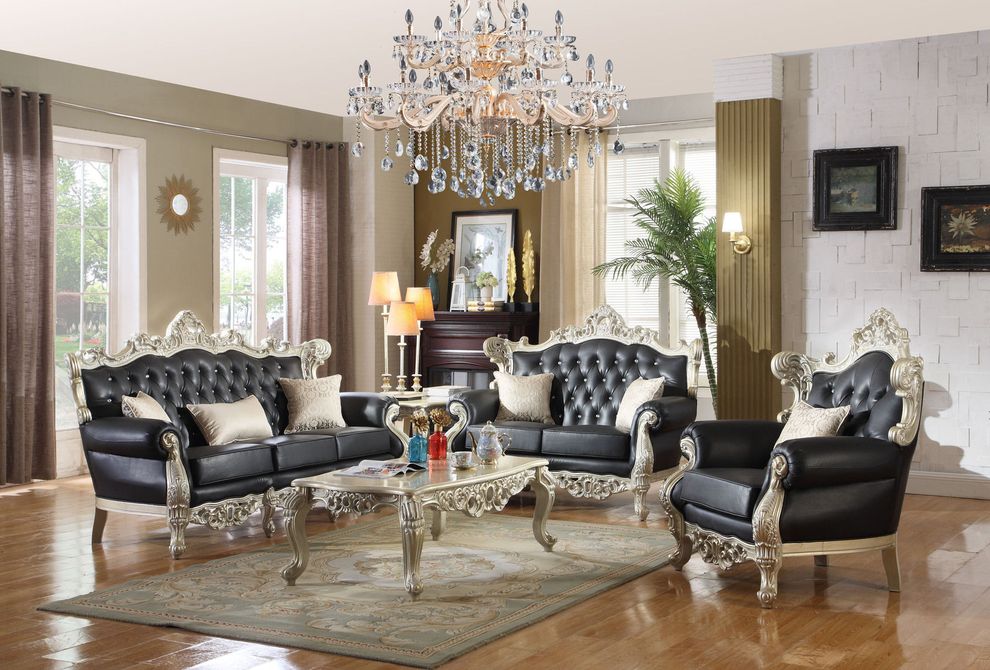 Black tufted bonded leather royal style sofa by Meridian