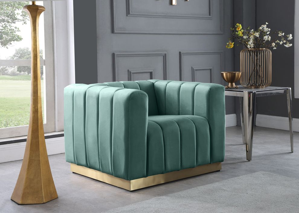 Low-profile contemporary velvet chair in mint by Meridian