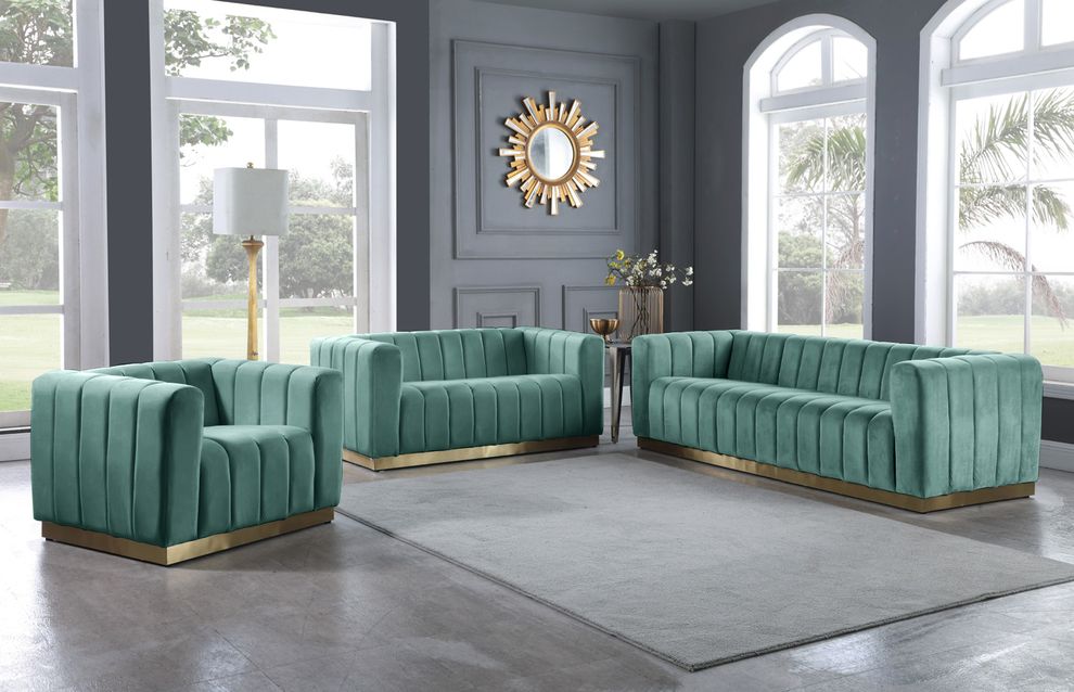 Low-profile contemporary velvet sofa in mint by Meridian