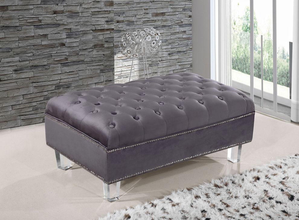 Contemporary style tufted velvet fabric ottoman by Meridian