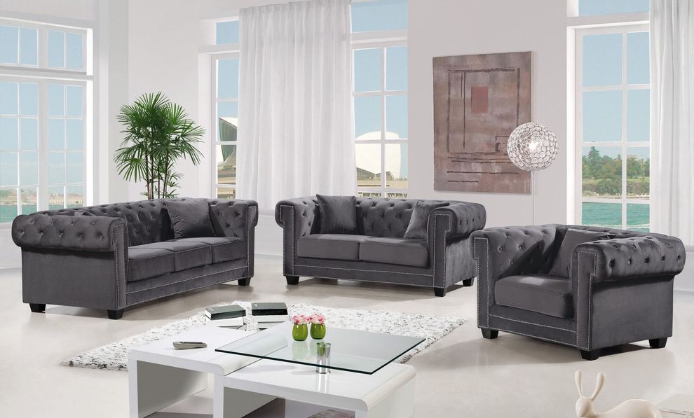 Modern gray fabric tufted back sofa w/ rolled arms by Meridian