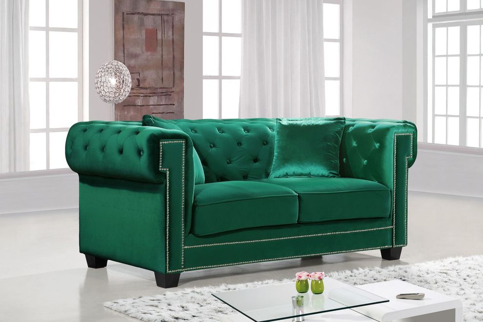 Green fabric tufted seat & back loveseat by Meridian
