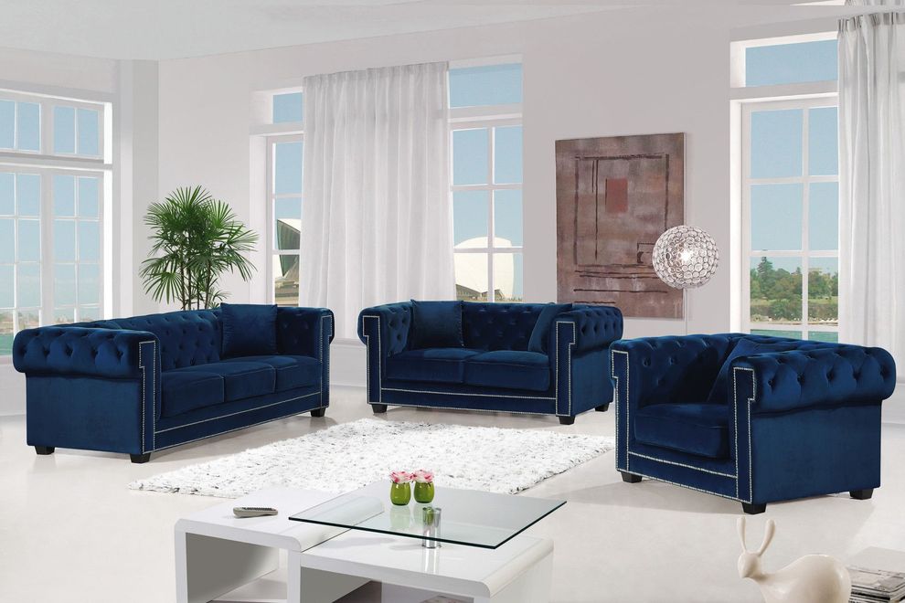 Modern navy fabric tufted back sofa w/ rolled arms by Meridian