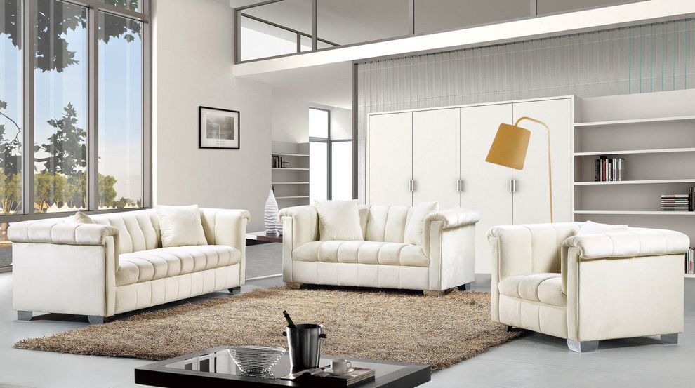 Cream velvet fabric tufted modern styled sofa by Meridian