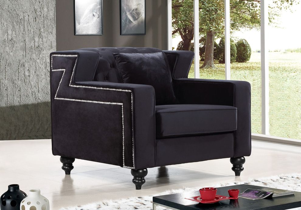 Tufted designer black fabric chair by Meridian