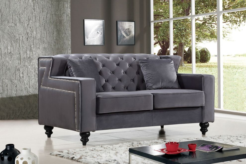 Tufted designer gray fabric loveseat by Meridian