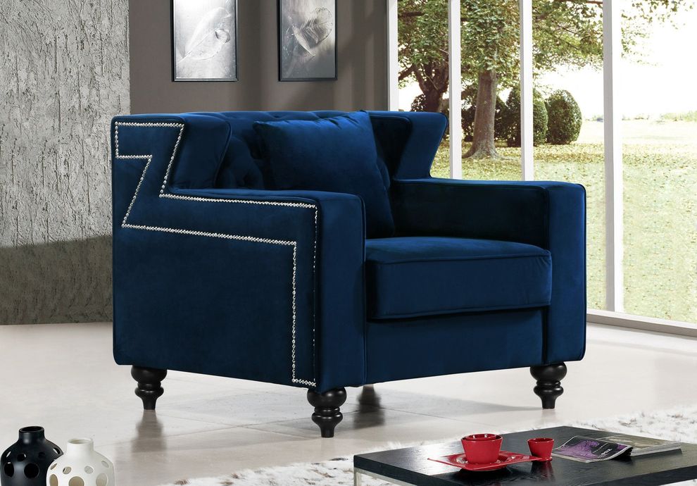 Tufted designer navy fabric chair by Meridian