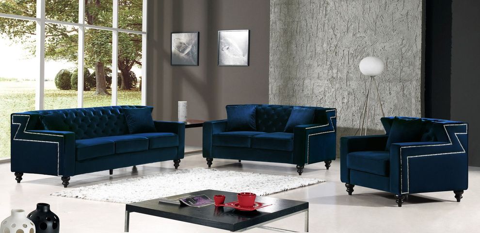 Tufted designer navy fabric sofa w/ nailhead trim by Meridian