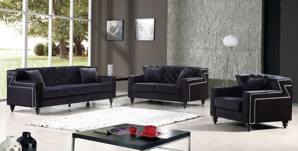 Tufted designer fabric sofa by Meridian
