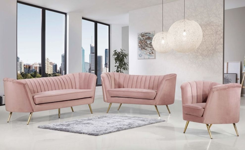 Curved pink velvet fabric sofa w/ gold legs by Meridian