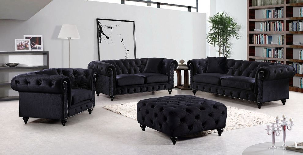 Black velvet fabric rolled arms design sofa by Meridian