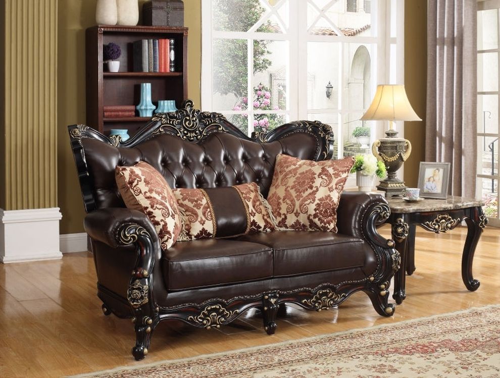 Rich cherry finish leather royal style tufted loveseat by Meridian