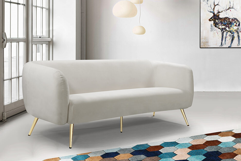 Elegant contemporary velvet / gold legs couch by Meridian