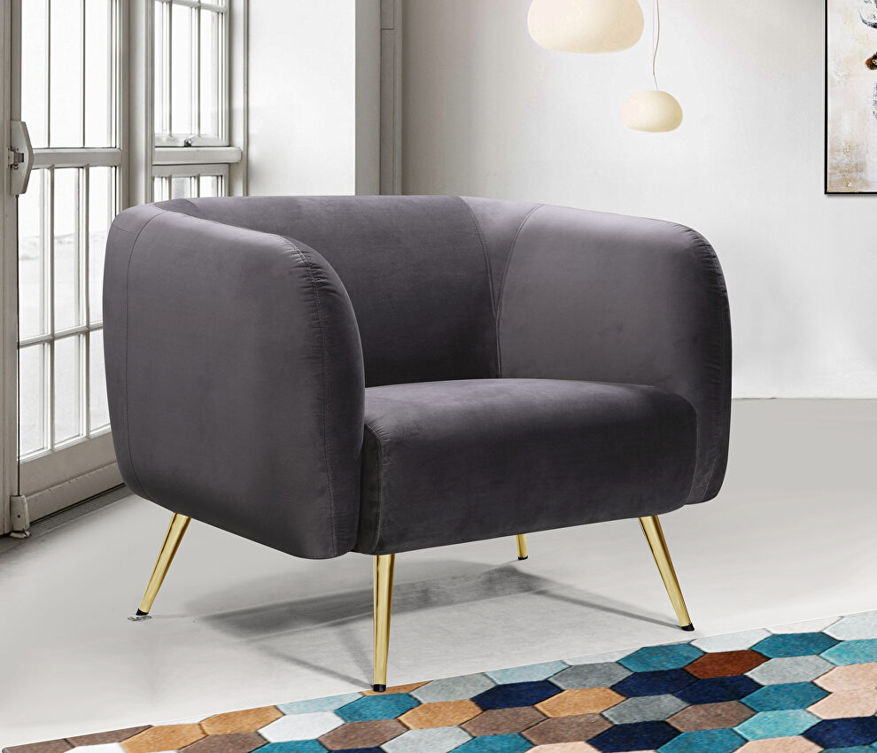 Elegant contemporary velvet / gold legs chair by Meridian