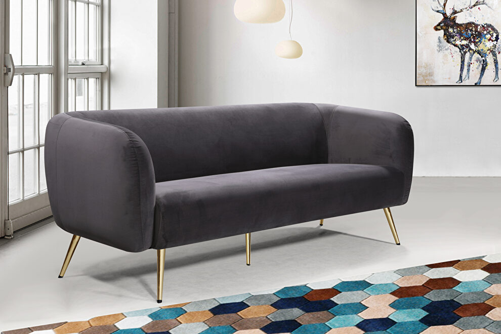 Elegant contemporary velvet / gold legs couch by Meridian