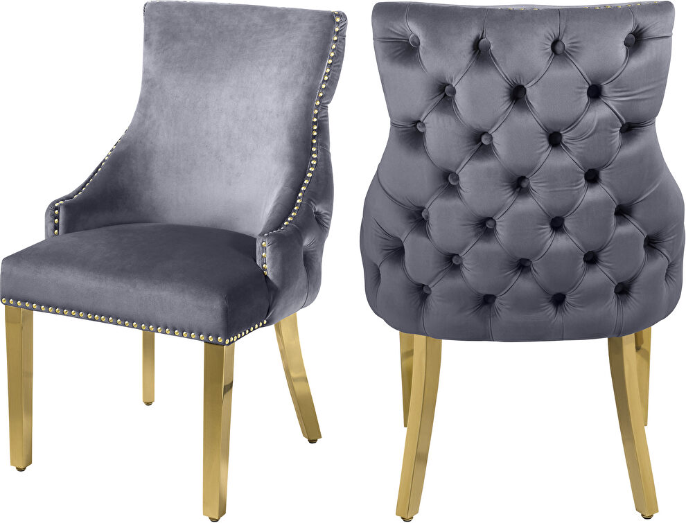 Elegant tufted velvet dining chair w/ golden legs by Meridian