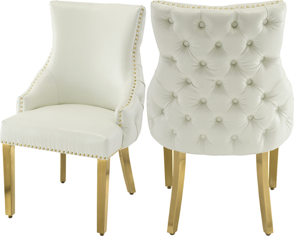 Elegant tufted vegan leather dining chair w/ golden legs by Meridian