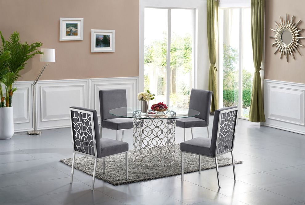 Round glass top contemporary dining table by Meridian