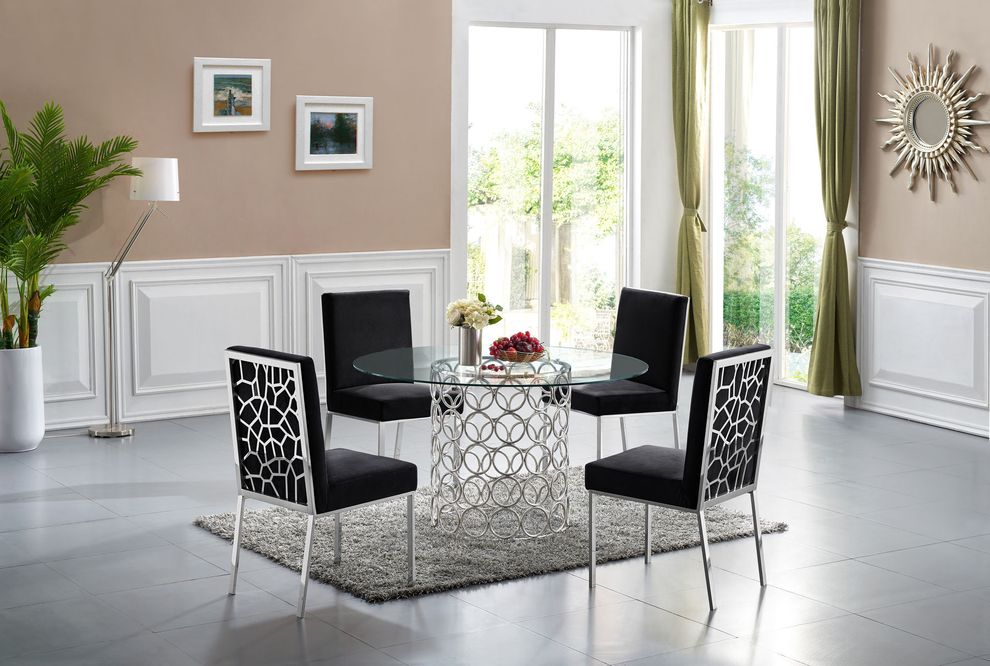 Round glass top contemporary dining table by Meridian