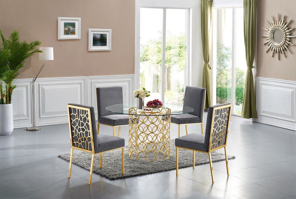 Round glass top contemporary dining table by Meridian