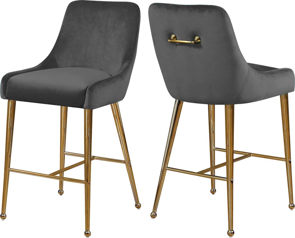 Gray velvet bar stool w/ golden hardware and handle by Meridian