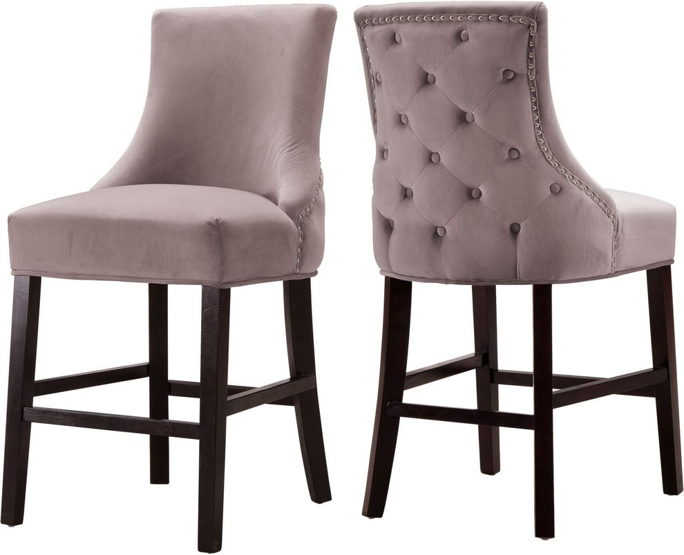 Set of pink velvet contemporary stools by Meridian