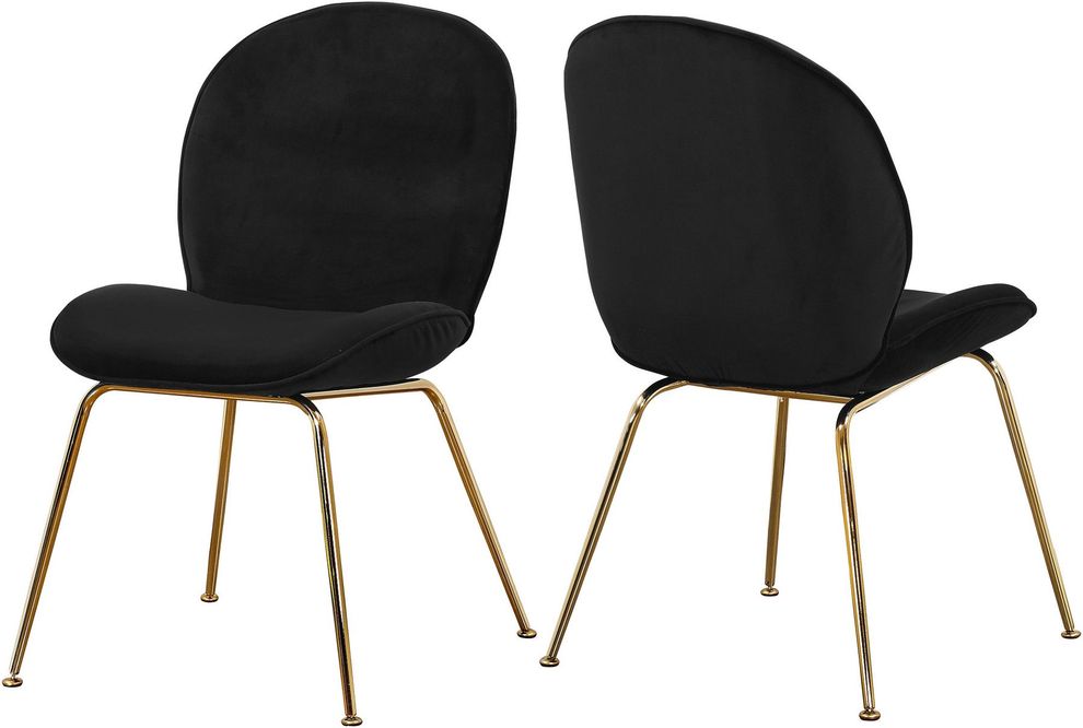 Black velvet dining chair w/ golden legs by Meridian