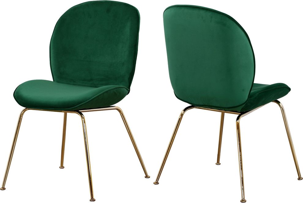 Green velvet dining chair w/ golden legs by Meridian