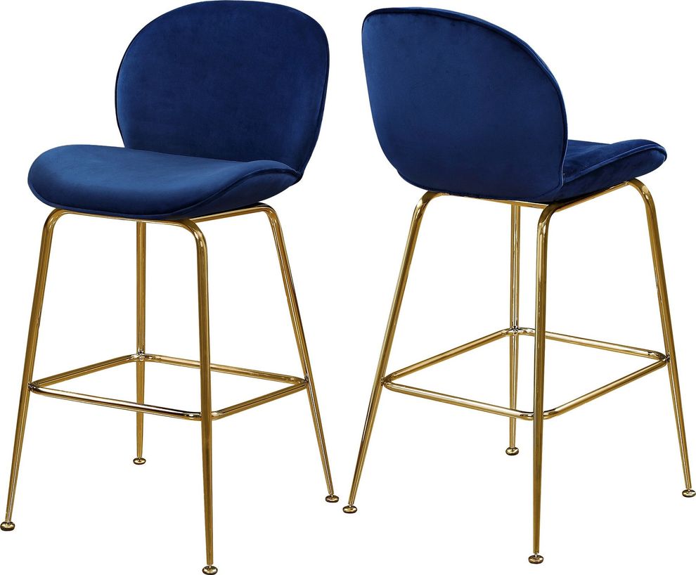 Elegant navy velvet bar stool w/ golden base by Meridian