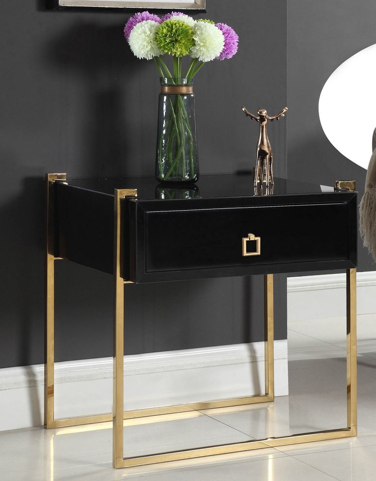 Gold/black contemporary nightstand by Meridian