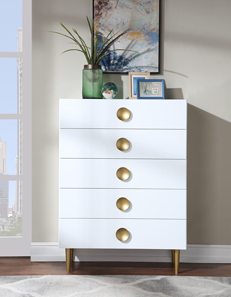 Contemporary white stylish chest w/ golden legs by Meridian