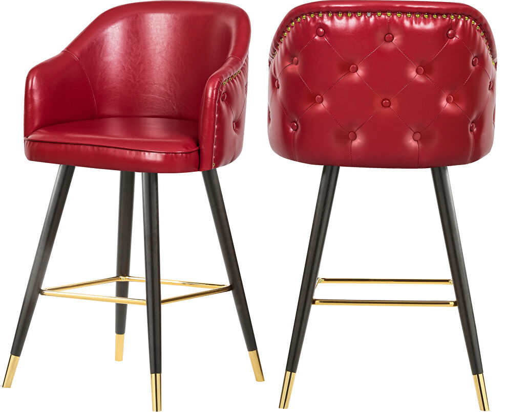 Rounded tufted back faux leather red / gold bar stool by Meridian