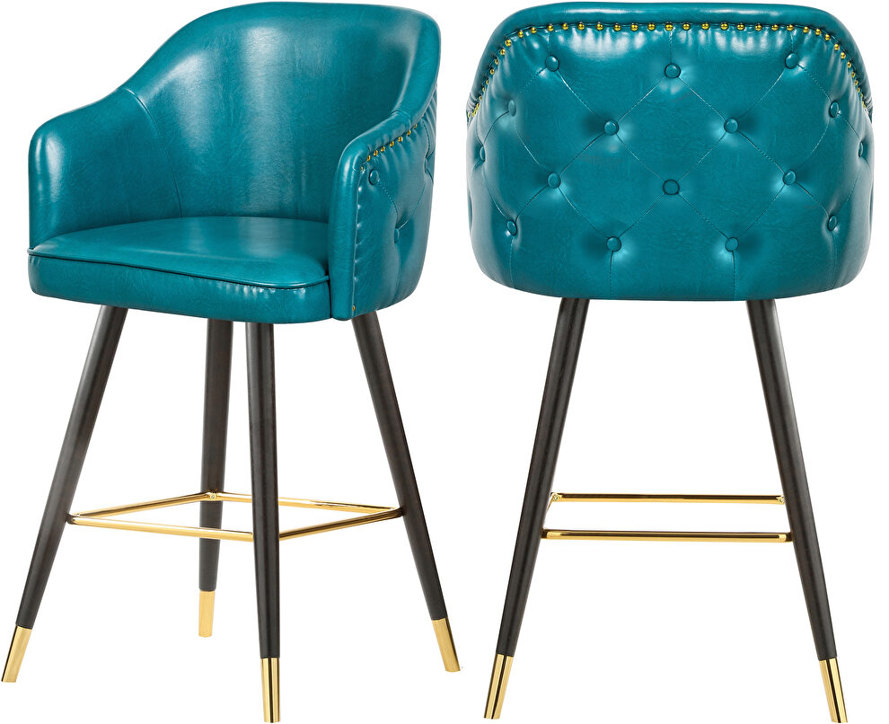 Rounded tufted back faux leather blue / gold bar stool by Meridian