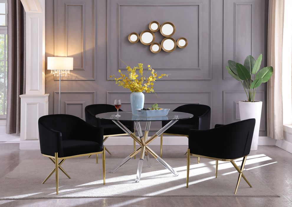 Round glass top dining table w/ golden legs by Meridian
