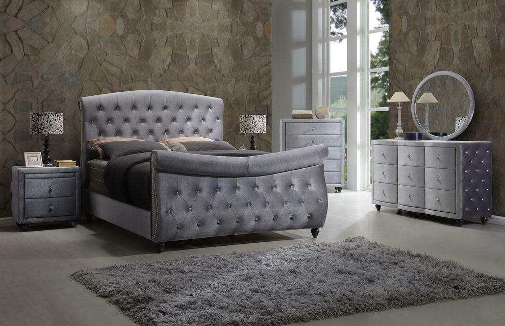 Gray fabric sleigh bed w/ tufted buttons design by Meridian