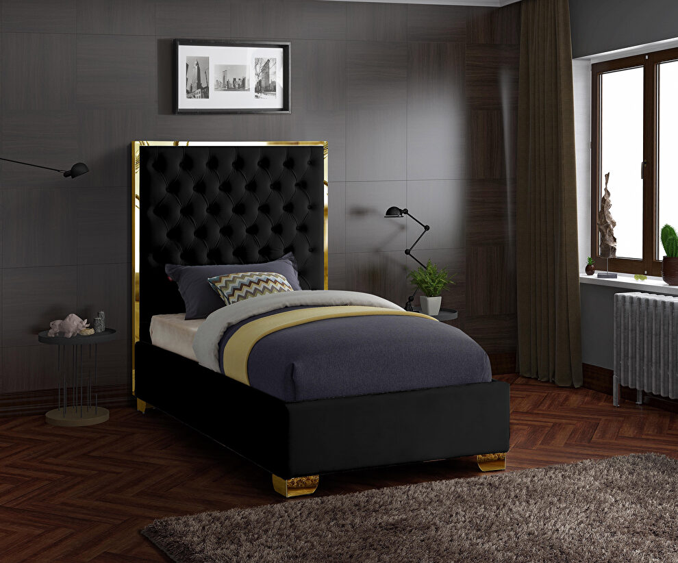 Modern gold legs/trim tufted bed in black velvet by Meridian