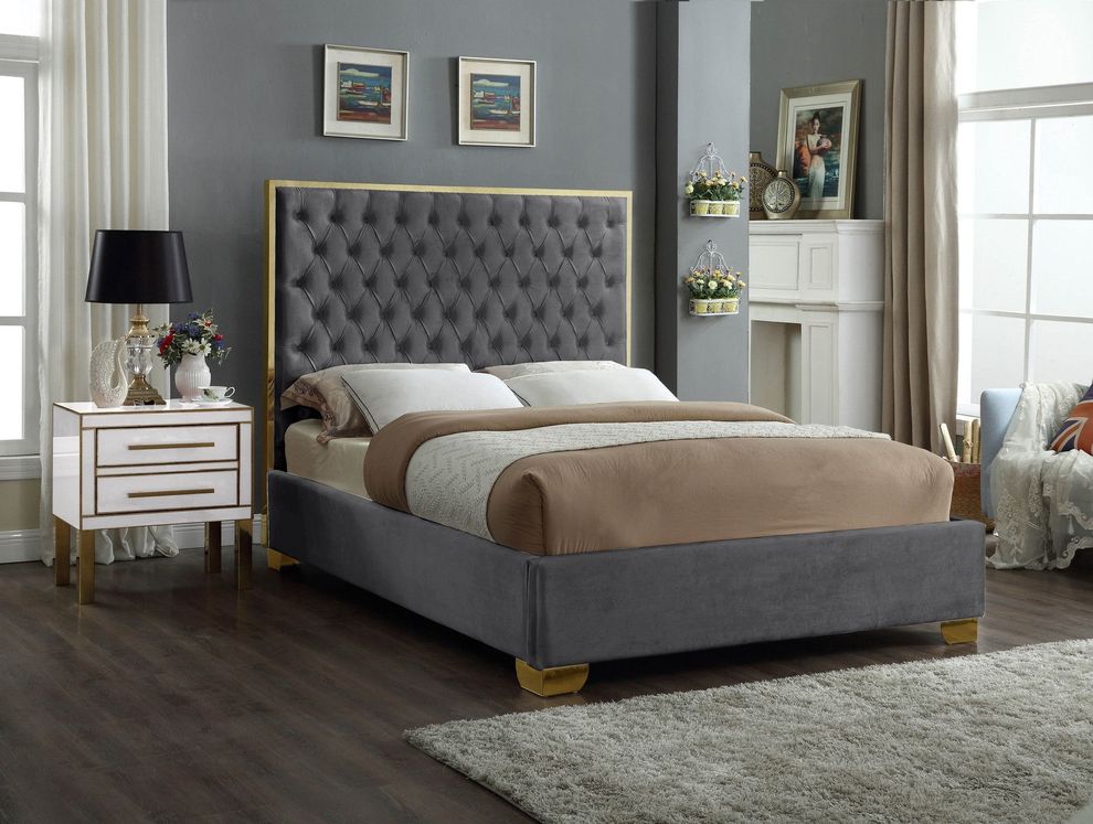 Modern gold legs/trim tufted bed in gray velvet by Meridian