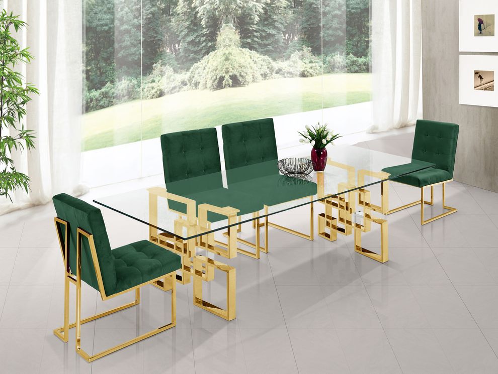 Glass top / golden metal base dining table by Meridian