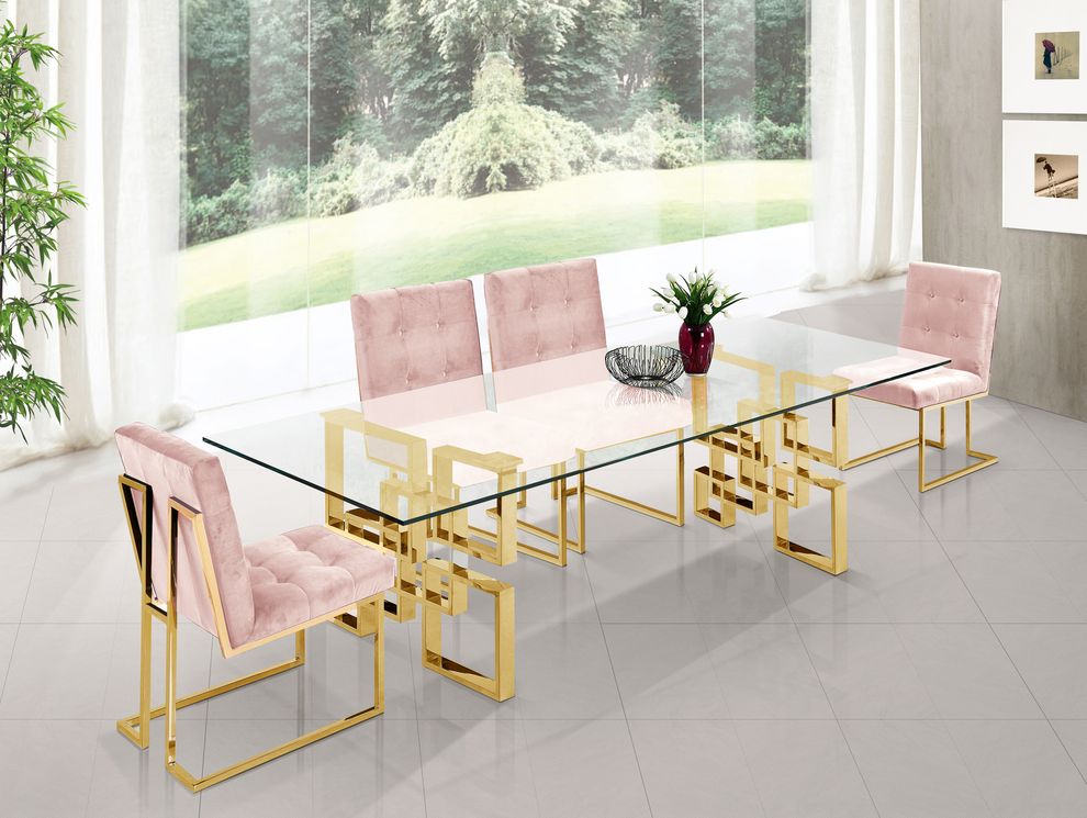 Glass top / golden metal base dining table by Meridian