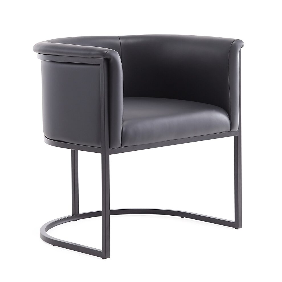 Black faux leather dining chair by Manhattan Comfort