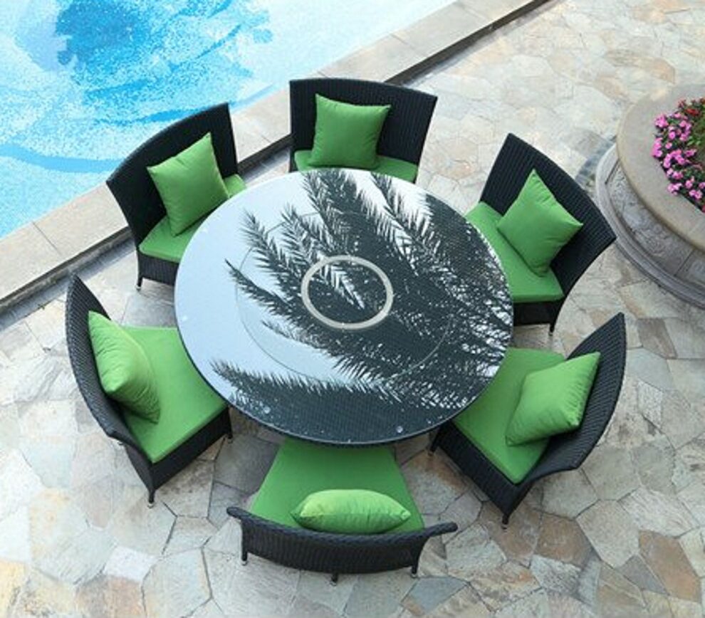 Black 7-piece rattan outdoor dining set with green cushions by Manhattan Comfort