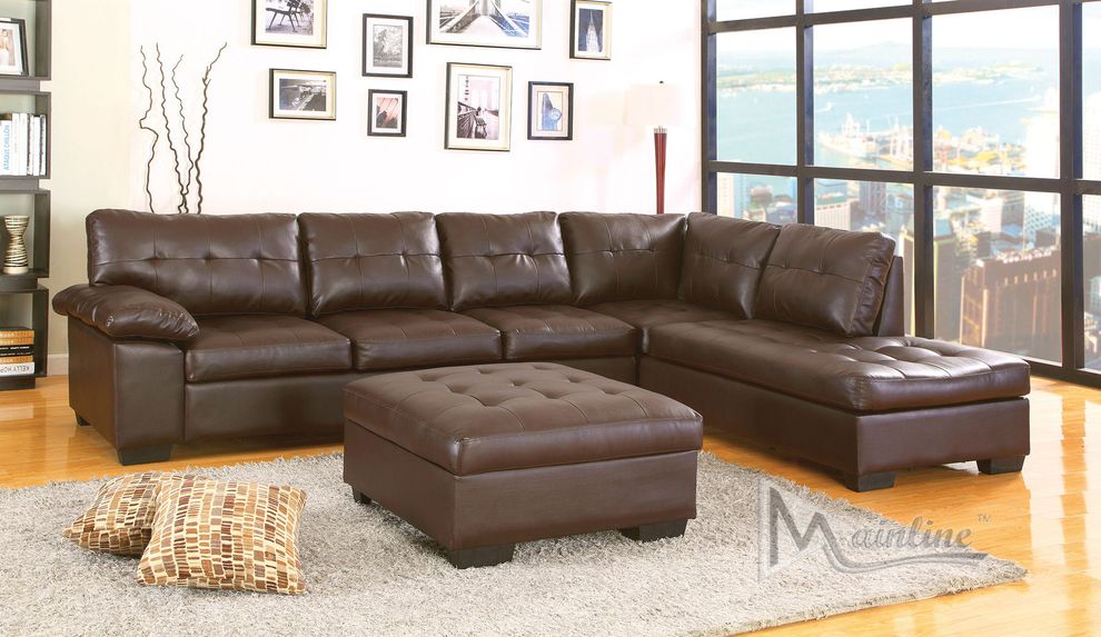Leather match sectional sofa in dark chocolate by Mainline