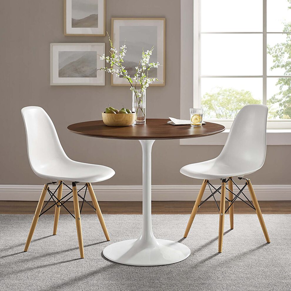 Round dining table in walnut by Modway