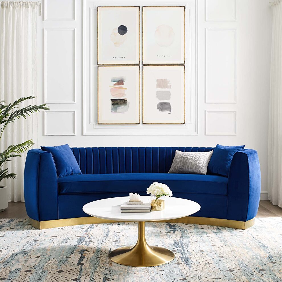 Channel tufted curved performance velvet sofa in navy by Modway