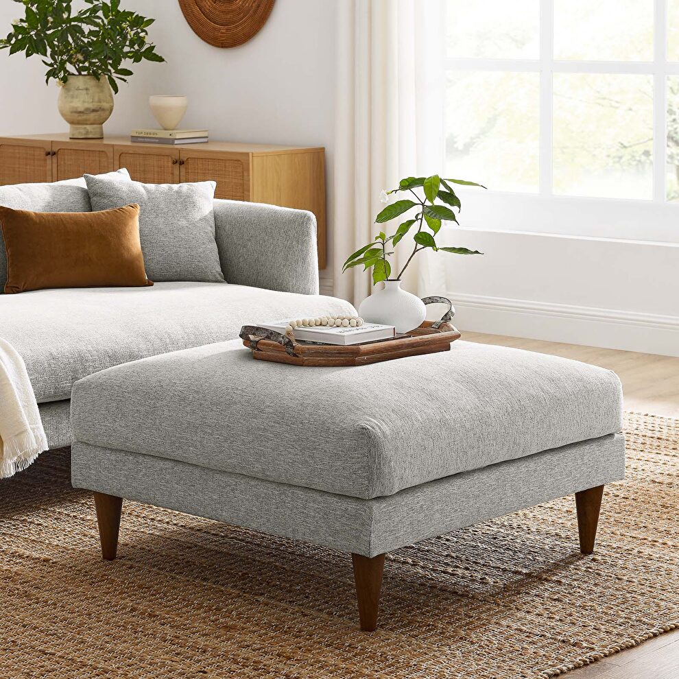 Light gray fabric upholstered ottoman in mid-century style by Modway
