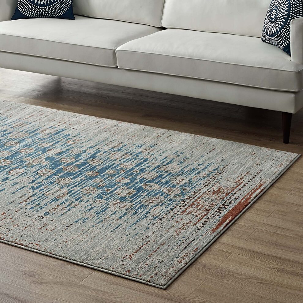 Distressed contemporary floral lattice area rug in teal, beige and brown by Modway