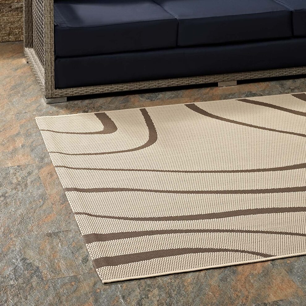Swirl abstract indoor and outdoor area rug in light and dark beige by Modway